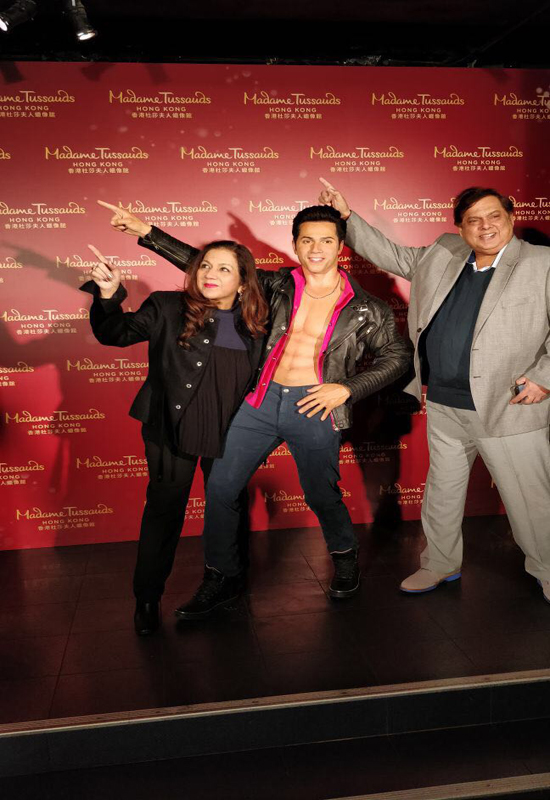 David Dhawan and wife Karuna Dhawan with Varun Dhawan's Wax statue