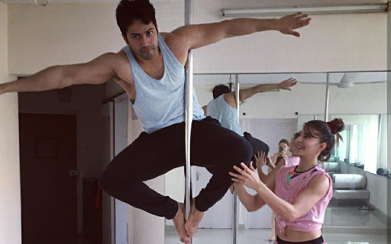 Jacqueline Fernandez teaching Varun Dhawan Pole Dancing