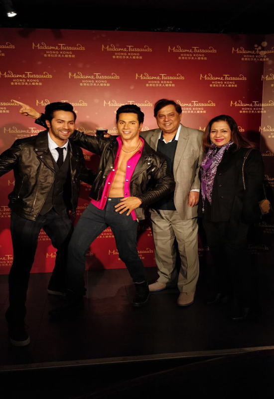 Varun Dhawan, David Dhawan, Karuna Dhawan with Varun Dhawan's Wax statue