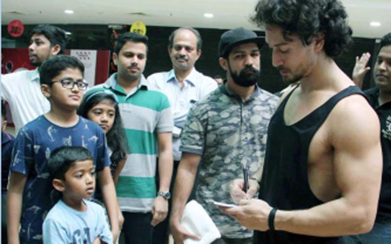 Tiger Shroff giving Autograph