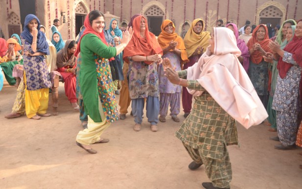 Kapil Sharma's sister Pooja Devgan (Green dress)