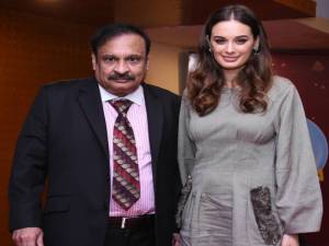CMD Country Club Rajeev Reddy with Evelyn Sharma