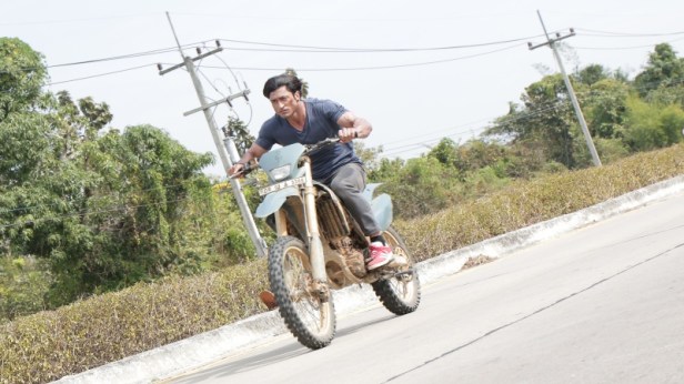 Vidyut Jammwal performing stunts on the bike